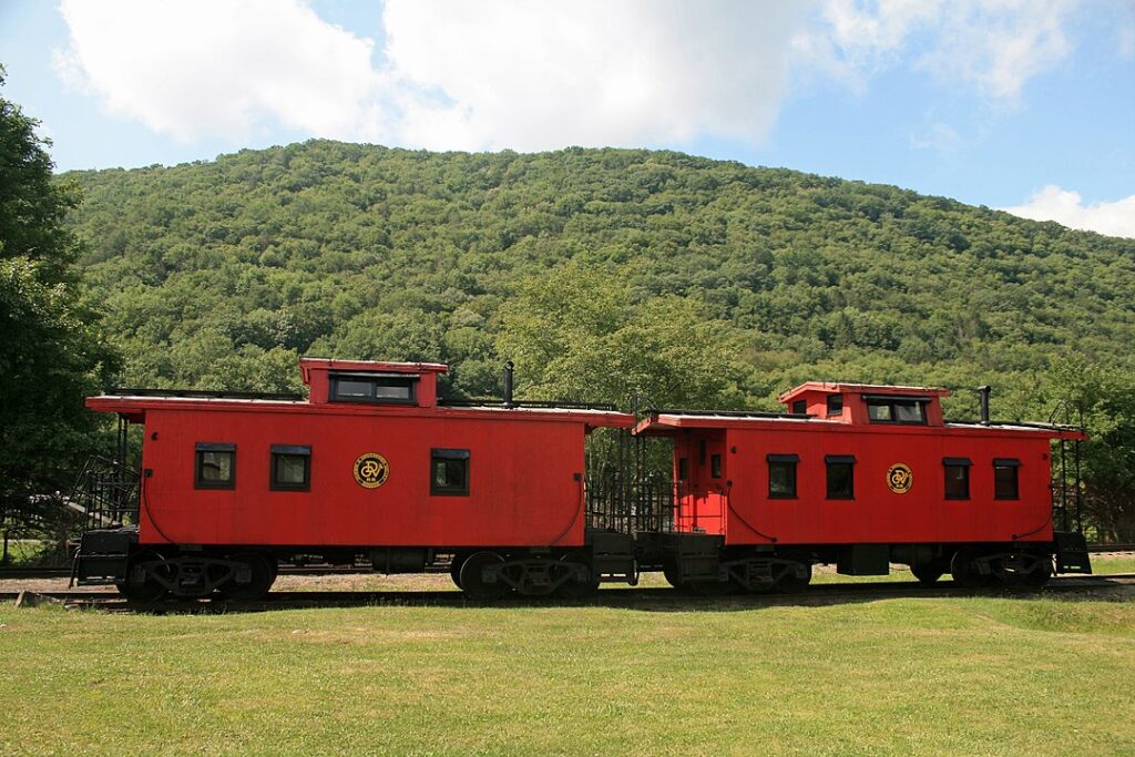 Durbin & Greenbrier Valley Cabooses
Wikimedia
Link: https://upload.wikimedia.org/wikipedia/commons/thumb/6/64/Durbin_%26_Greenbrier_Valley_Cabooses_%283805651928%29.jpg/1280px-Durbin_%26_Greenbrier_Valley_Cabooses_%283805651928%29.jpg
